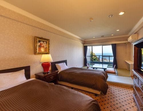 本館和洋室（4畳半＋ツインベッド）の一例