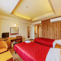 Kamar Twin / 21 m² Kapasitas: 1–3 orang