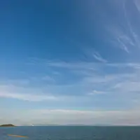 Laut dan langit terbentang luas di depan mata.