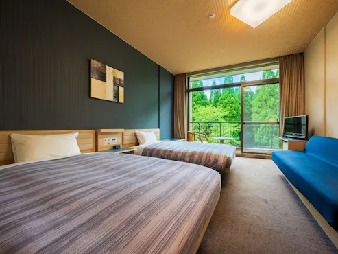 <ห้องพัก B> ห้องเตียงคู่ B - ฝั่งป่า (24.37 ตร.ม.)