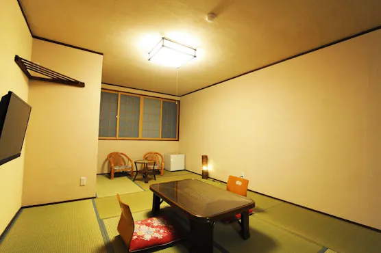 11-tatami Japanese-style room with toilet and washbasin.