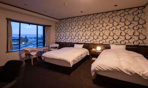 ห้องพักแบบตะวันตกหรือห้องพักแบบญี่ปุ่น-ตะวันตกที่โรงแรมจัดให้