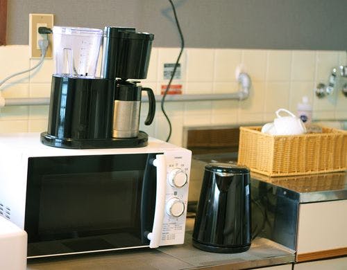 Melitaコーヒーマシンと電子レンジ