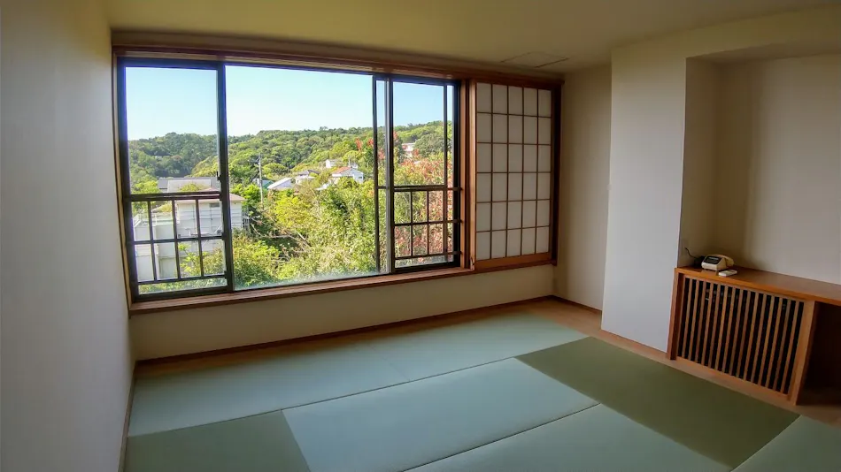 Accommodation "Ippon no enpitsu Singing in the Wind"