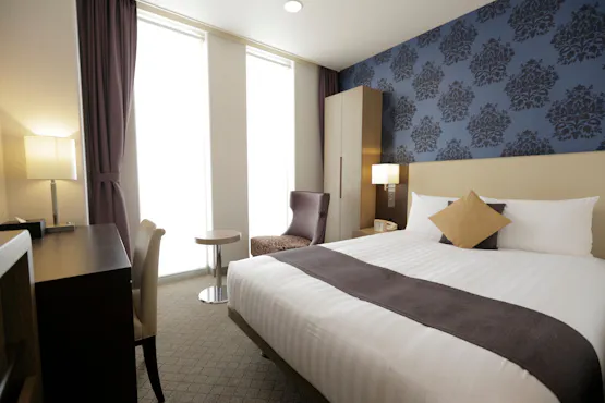 Kamar double 16m² di lantai teratas.