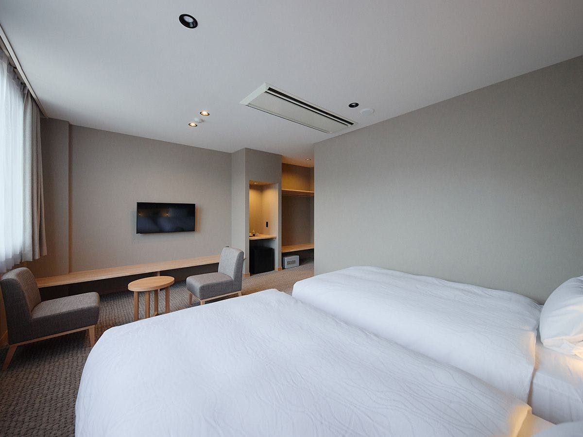 【ห้องพักแบบเตียงคู่สไตล์ตะวันตก】ที่นอนเป็นเตียง Simmons