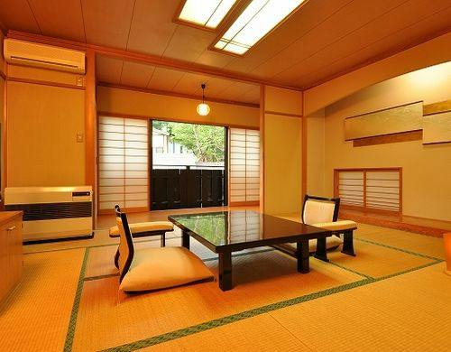 離れ（戸建）客室の露天風呂（一例）