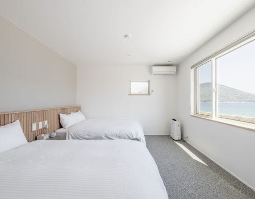 ２階：ダブルベッド二台の寝室が二部屋