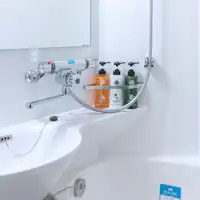 Pemegang botol syampu anti-jatuh