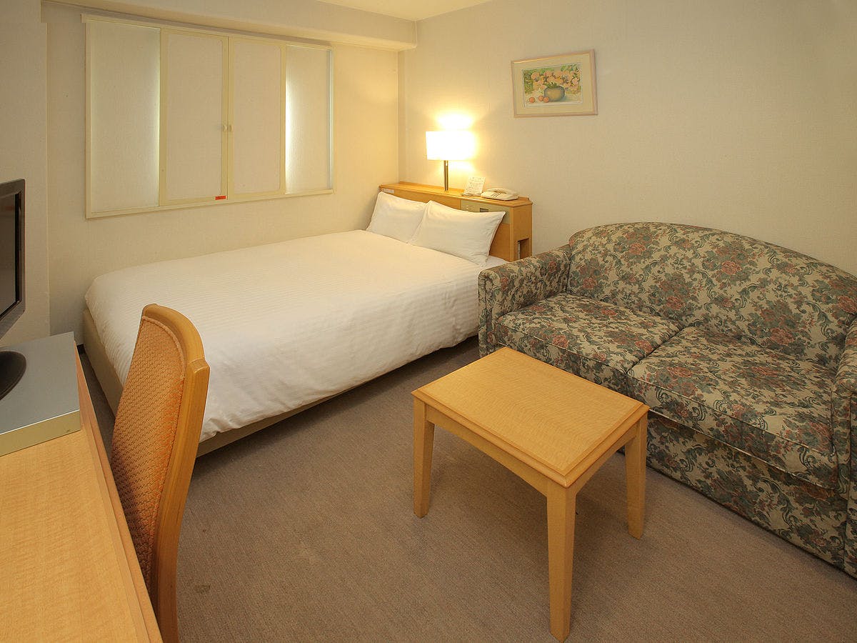 Kamar Deluxe Semi-Double