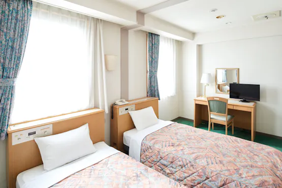 ห้องพักเตียงคู่พร้อมห้องน้ำสองห้อง