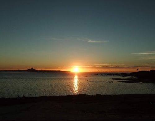 沈みゆく夕日はまさに美らあかなー