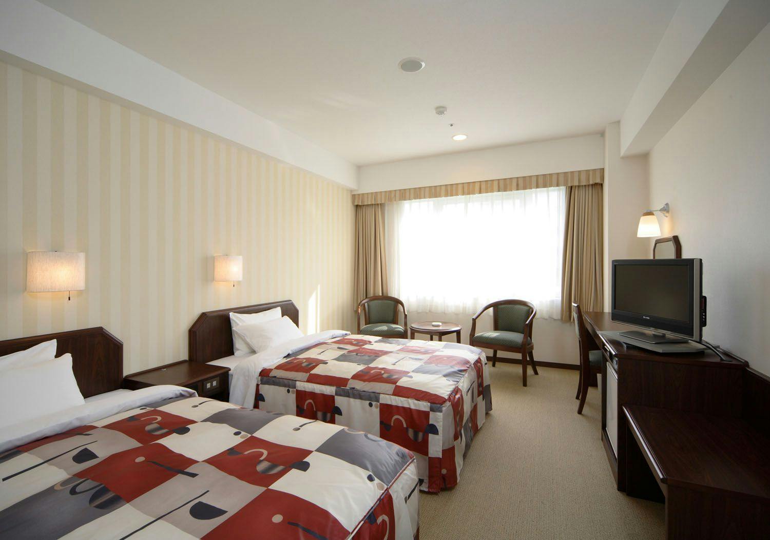 Kamar twin: Luas 23 meter persegi