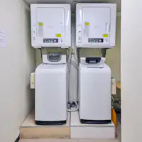 มุมเครื่องซักผ้าหยอดเหรียญ ชั้น 4