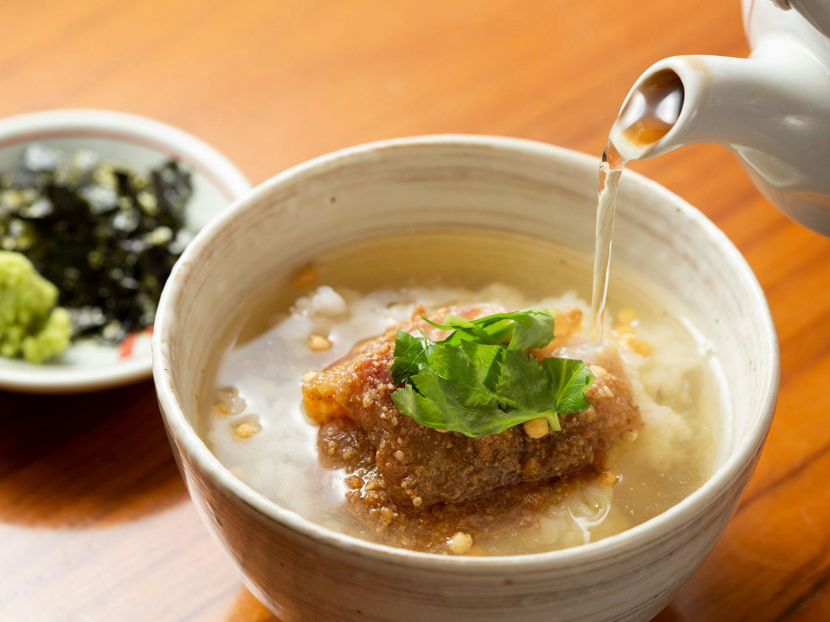 ข้าวต้มปลากระพง【แผนพร้อมบัตรรับประทานอาหารร้านอาหารพันธมิตร】