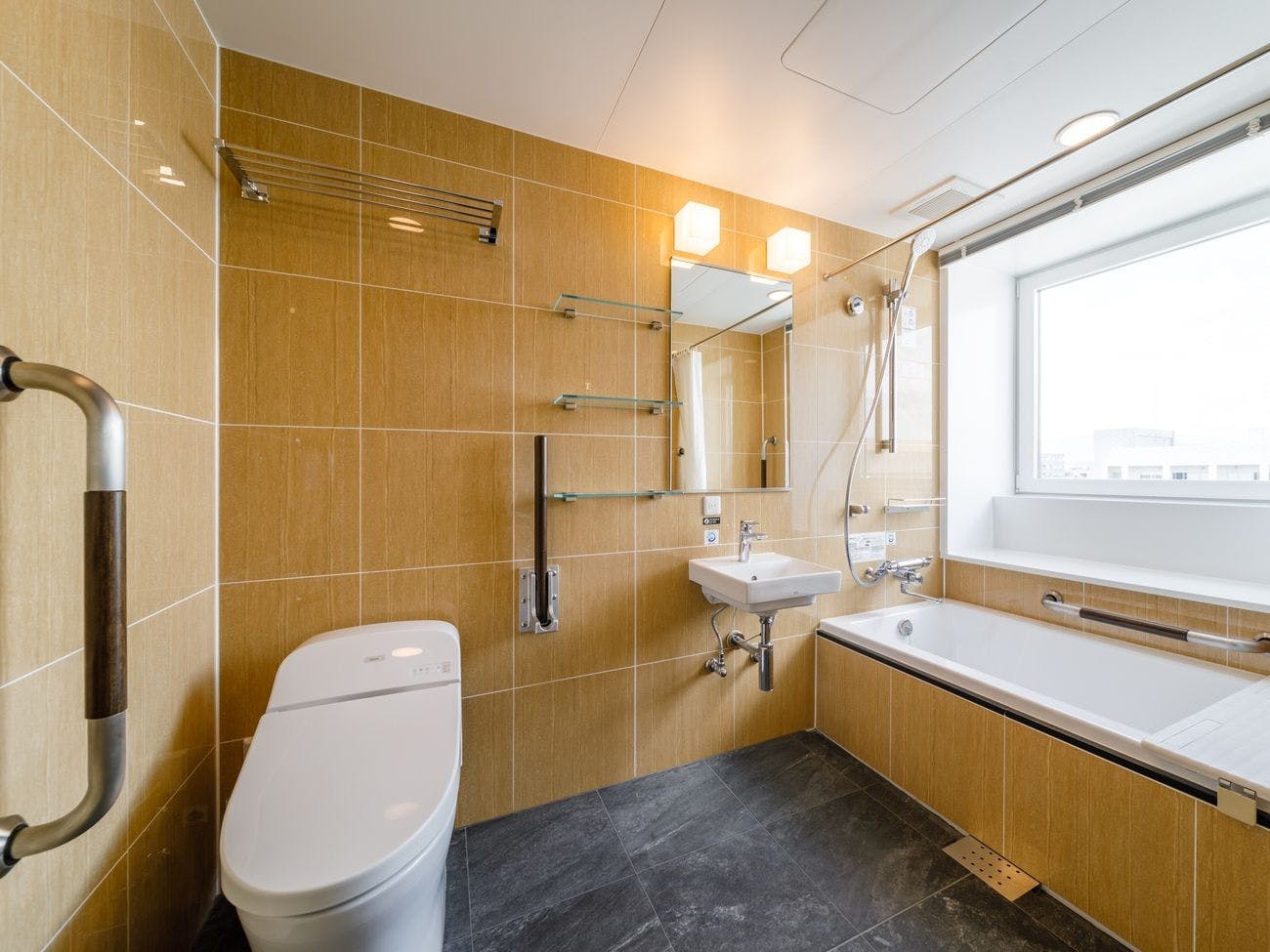 ห้องน้ำแบบยูนิต (เฉพาะห้องดีลักซ์ทวินรูม)