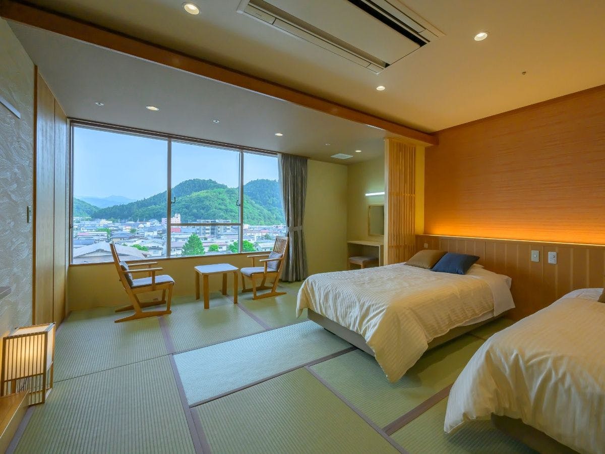 ห้องพักสไตล์ญี่ปุ่นแบบเตียงคู่ (พร้อมฝักบัว)