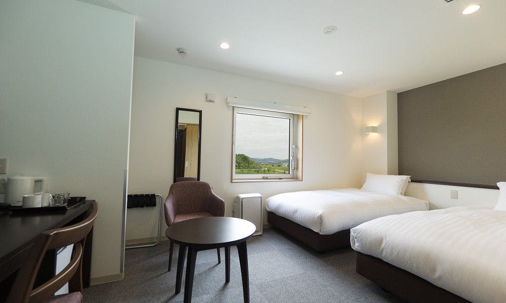 อาคารใหม่มีห้องน้ำและห้องสุขาแยกจากกัน ภาพถ่ายเป็นห้องเตียงคู่