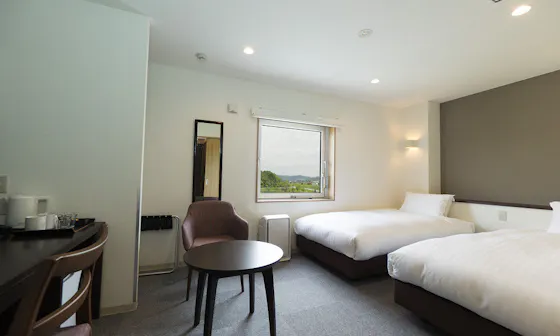 อาคารใหม่มีห้องน้ำและห้องสุขาแยกจากกัน ภาพถ่ายเป็นห้องเตียงคู่