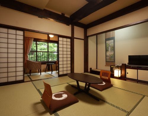 和室8畳-次の間には寛ぎのチェアーが