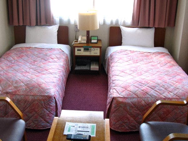 ผ่อนคลายในห้องเตียงคู่ที่กว้างขวาง