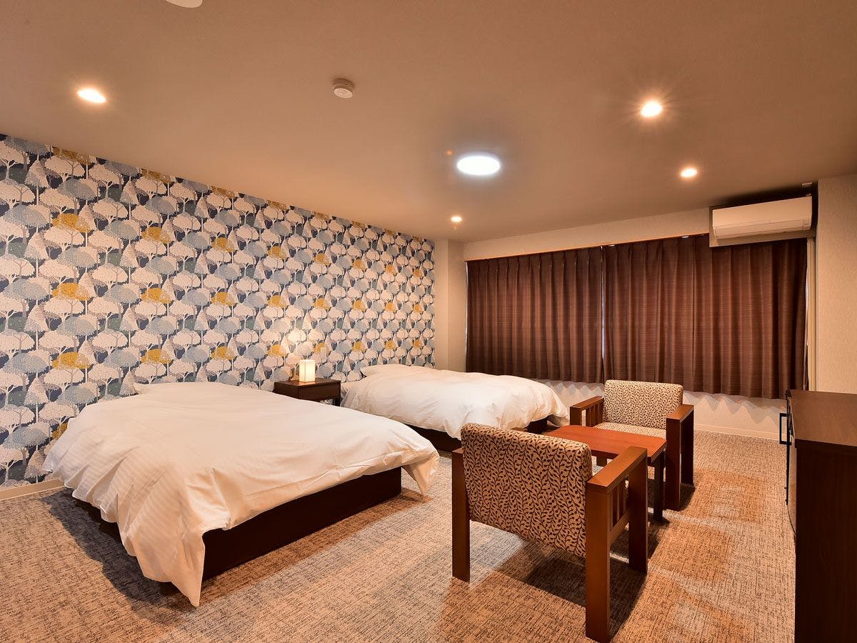 Deluxe Twin (พร้อมห้องน้ำและห้องสุขา)