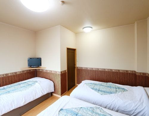 3名が定員のトリプルベッドルーム *