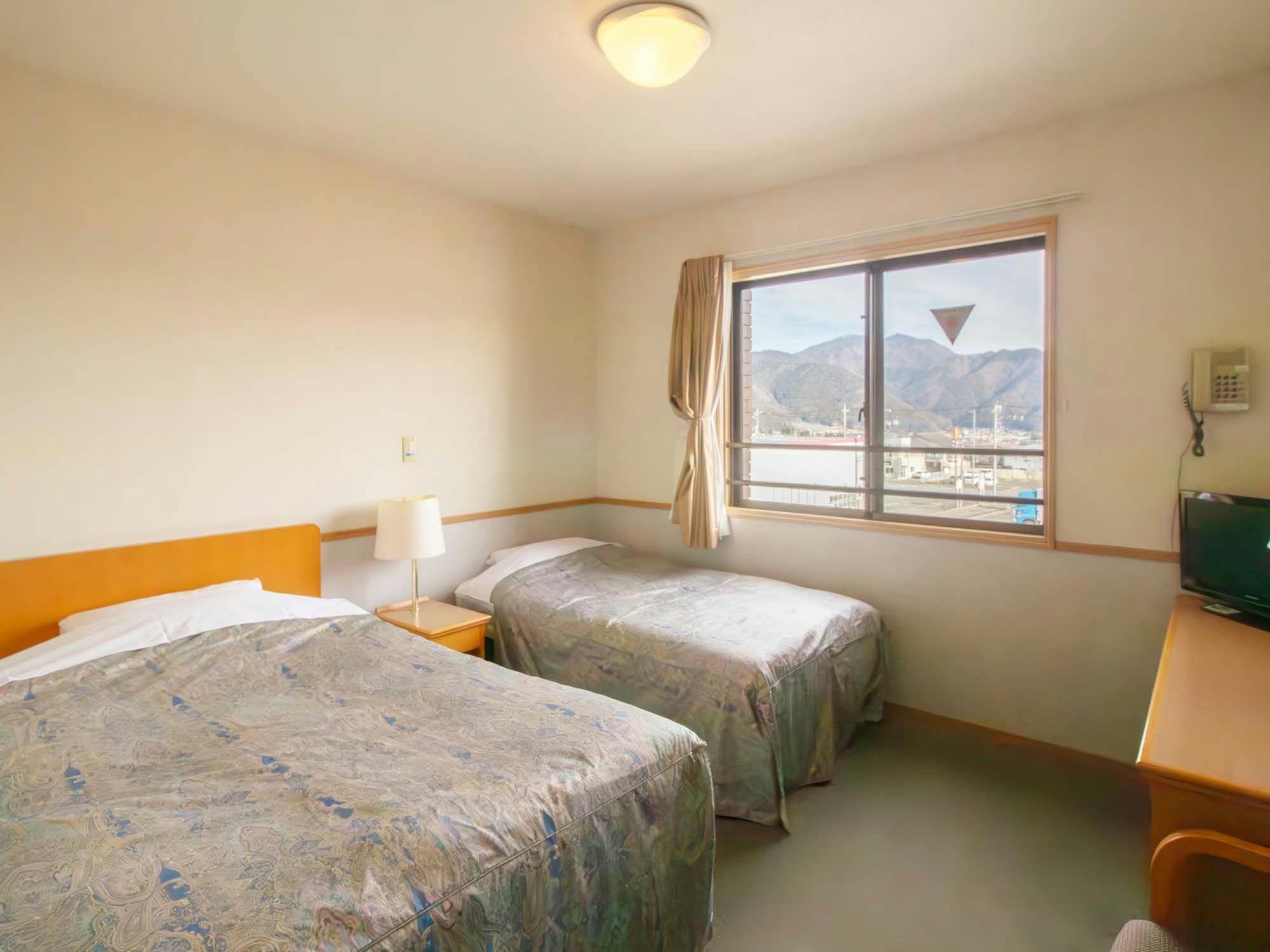 Single / Petite Twin Room