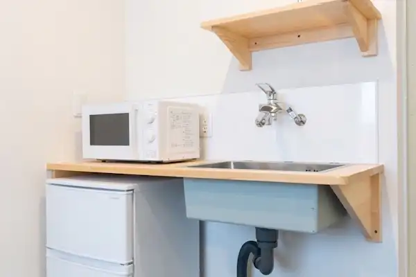 Equipped with a refrigerator and microwave.
