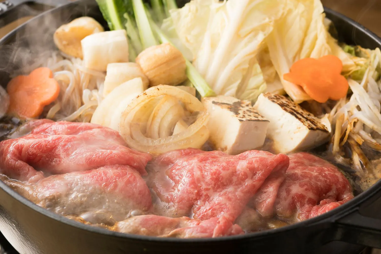 Enjoy sukiyaki featuring the local specialty beef, Tsuyama Wagyu