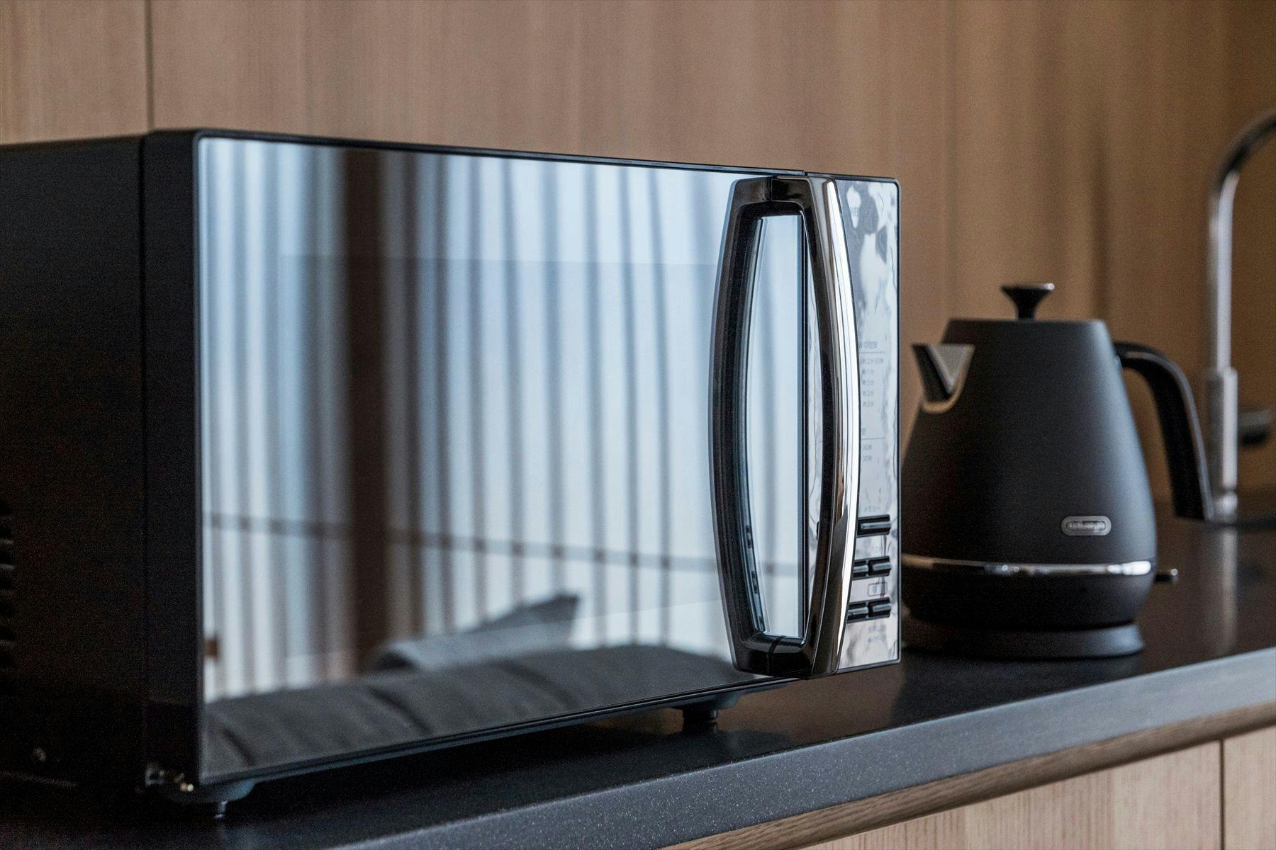 Microwave (hanya untuk tipe suite)