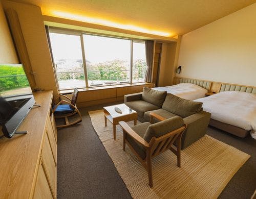 ツインベッドと和室10畳が独立の和洋タイプ