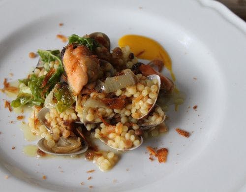 旬のお野菜と貝の出汁を含ませたフレーゴラ