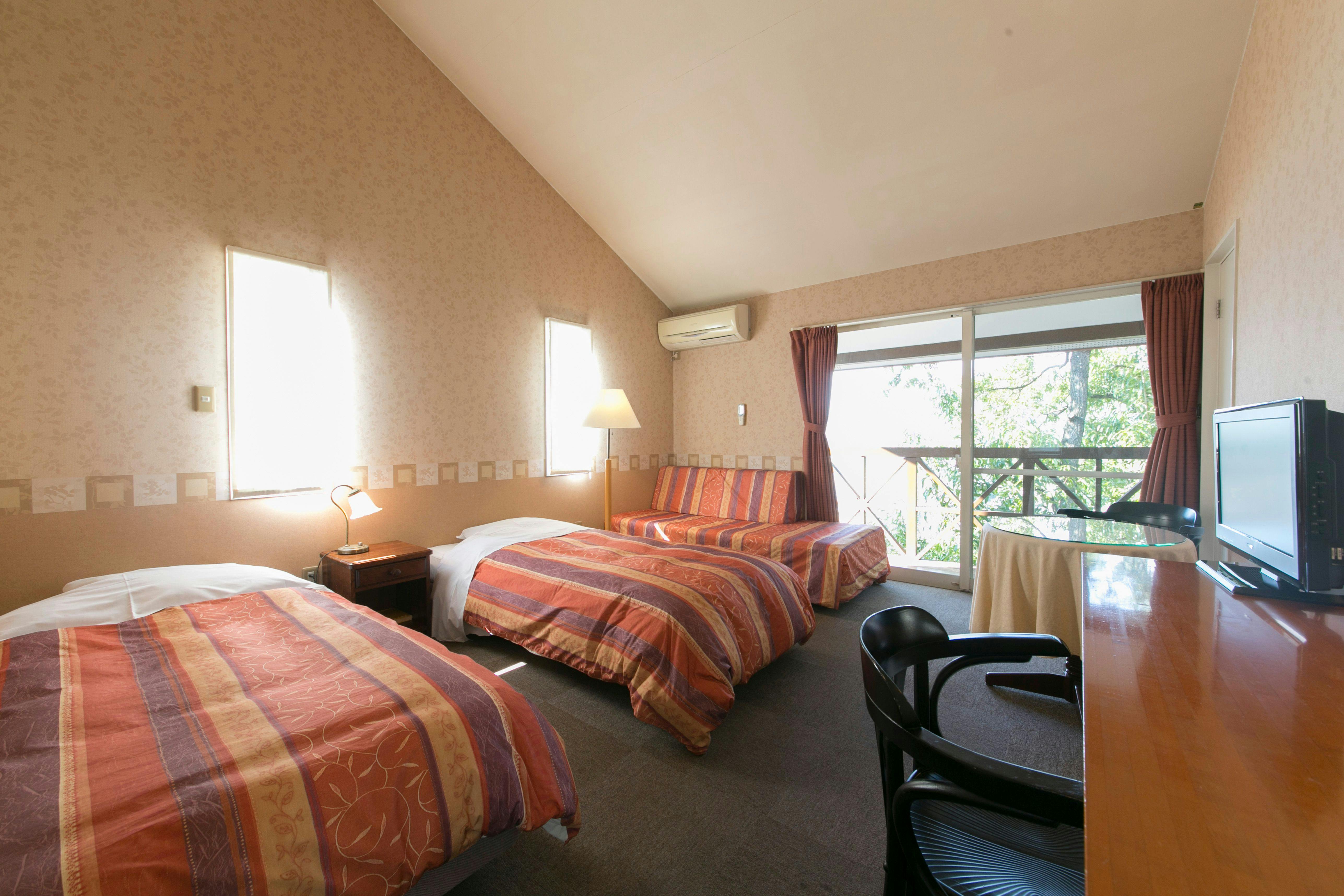 ห้องพักเตียงคู่ 21 ตร.ม. วิวทะเล อาคารเสริม