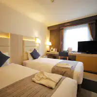 นี่คือห้องพักที่มีเตียง 2 เตียง ขนาด 16.8 ตารางเมตร