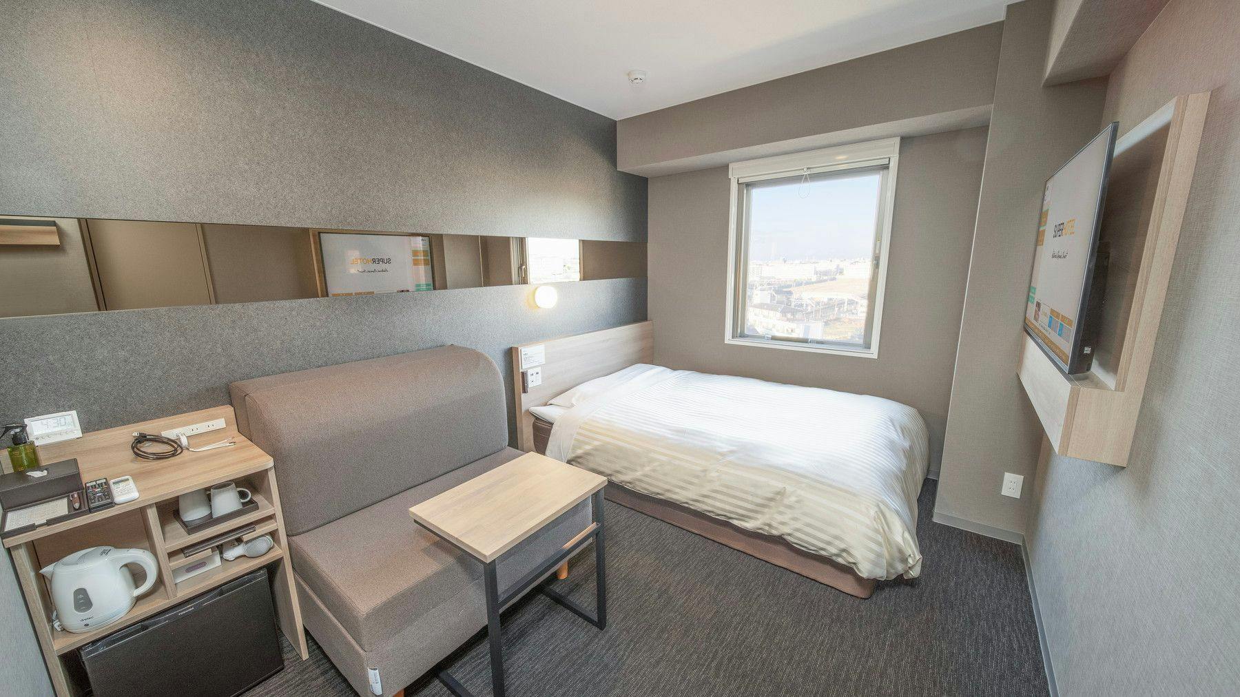 ห้องเตียงคู่พร้อมโซฟา