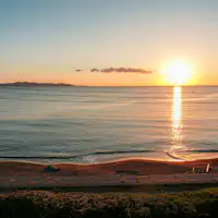 พระอาทิตย์ตกดินที่อ่าวทะเตยามะ