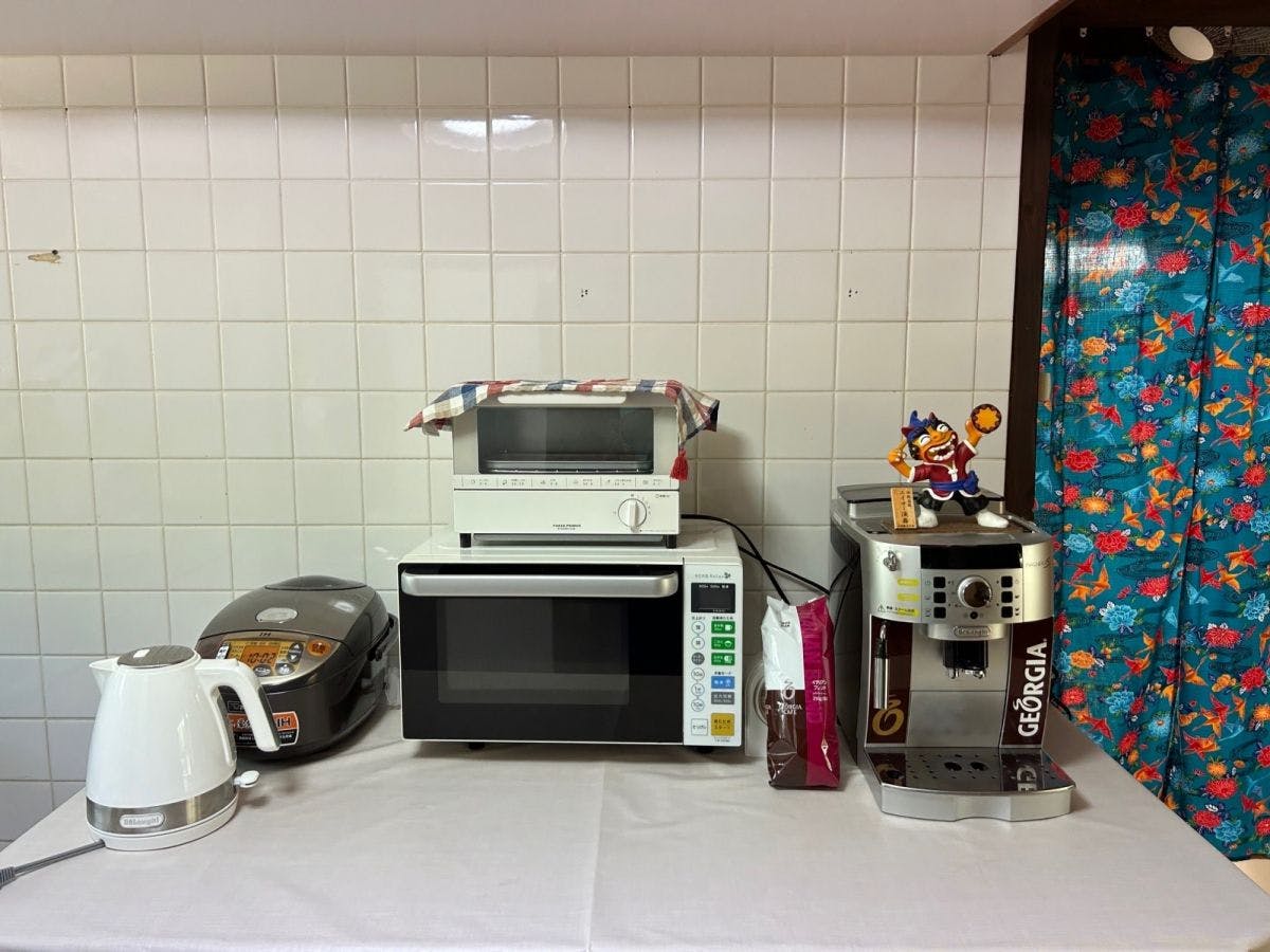 A full set of cooking utensils is provided.