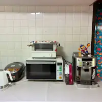 A full set of cooking utensils is provided.