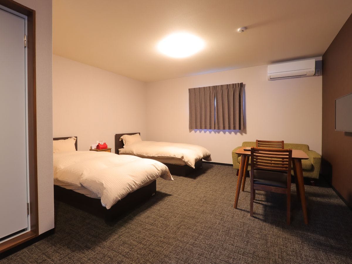 ห้องพักเตียงคู่กว้างขวาง 'MANMOSU'