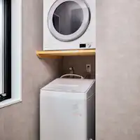 เครื่องซักผ้าพร้อมระบบเติมน้ำยาอัตโนมัติและเครื่องอบผ้าแก๊สครบครัน