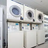コインランドリー8階に設置。洗剤自動投入