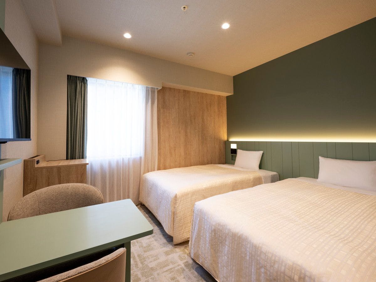 Imej bilik tetamu selepas pengubahsuaian