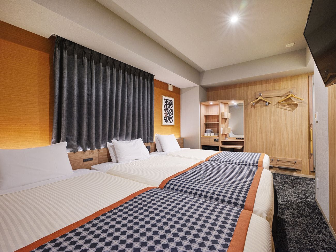 ห้องสแตนดาร์ดเตียงคู่ (พร้อมเตียงเสริมแบบดึงออกได้)