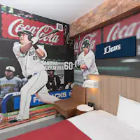 ห้องพักนี้ใช้ภาพหลักเป็นนักกีฬา นากามูระ