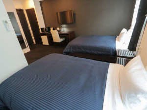 Kamar twin. Anak berbagi tempat tidur jika lebih dari 2 orang.