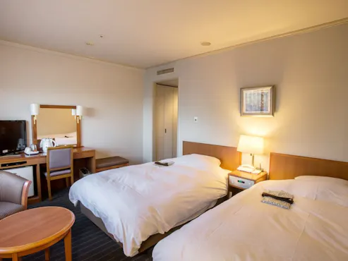 Twin dengan 2 tempat tidur semi-double lebar 120cm.