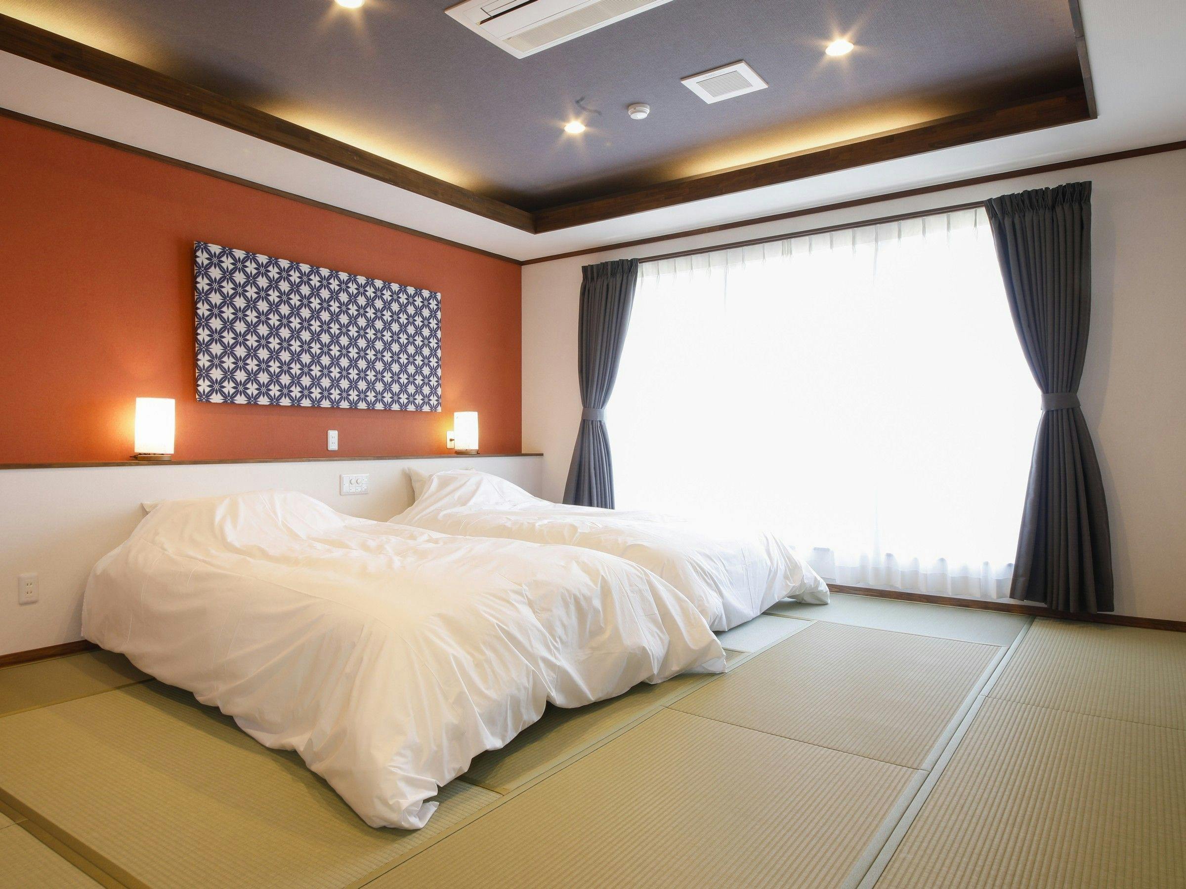 ห้องพักพร้อมอ่างอาบน้ำกลางแจ้งบางส่วน