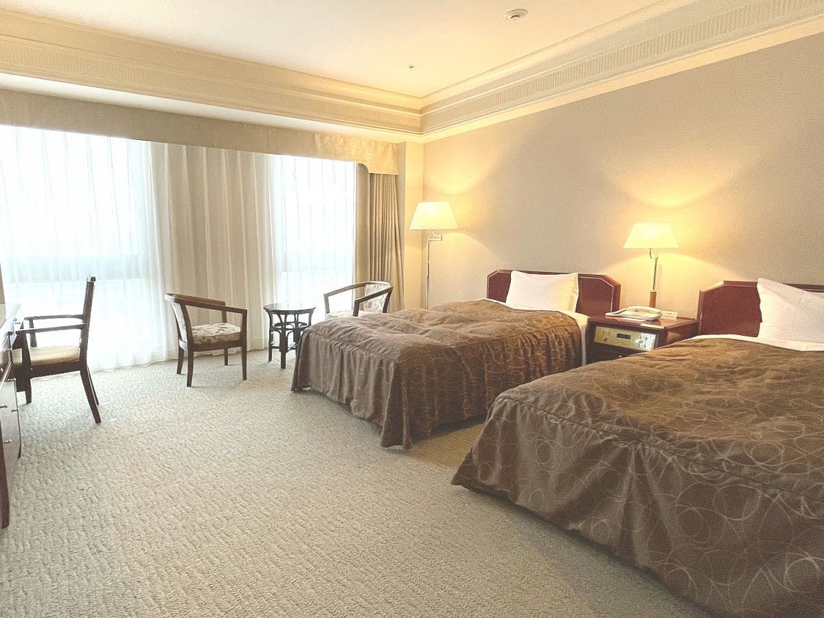 [ห้องดีลักซ์เตียงคู่ที่ปรับปรุงบางส่วน]