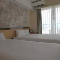 Phòng Twin với tầm nhìn ra biển qua lều
